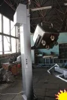 Подъемник-опрокидыватель тележек